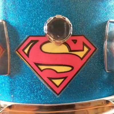 Pearl Export custom Assaulted Battery two color Superman themed graphics over a blue sparkle wrap. image 4
