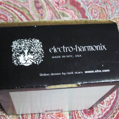 less than light average wear condition Electro Harmonix EMPTY BOX and original Owner's Manual ONLY for EXO Metal Muff with Top Boost pedal (NO pedal, NO warranty / registration paperwork) BOX: Cardboard / BOX Color: Black / GRAPHIC: Black & White, White image 13