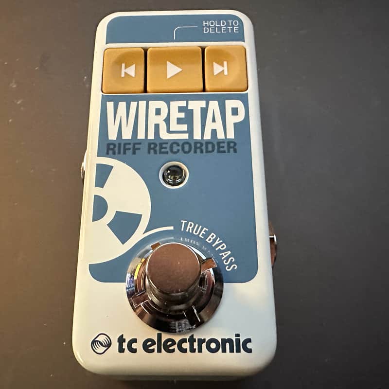 White and silver wiretap riff recorder in original box, complete with quick start guide.
