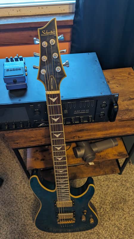 Schecter Omen Extreme-6 2010 - Present - Ocean Blue Burst image 1