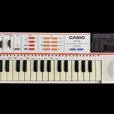 1986 Casio PT-82 32-Key Mini Portable Toy Keyboard w/ World Songs ROM Pack