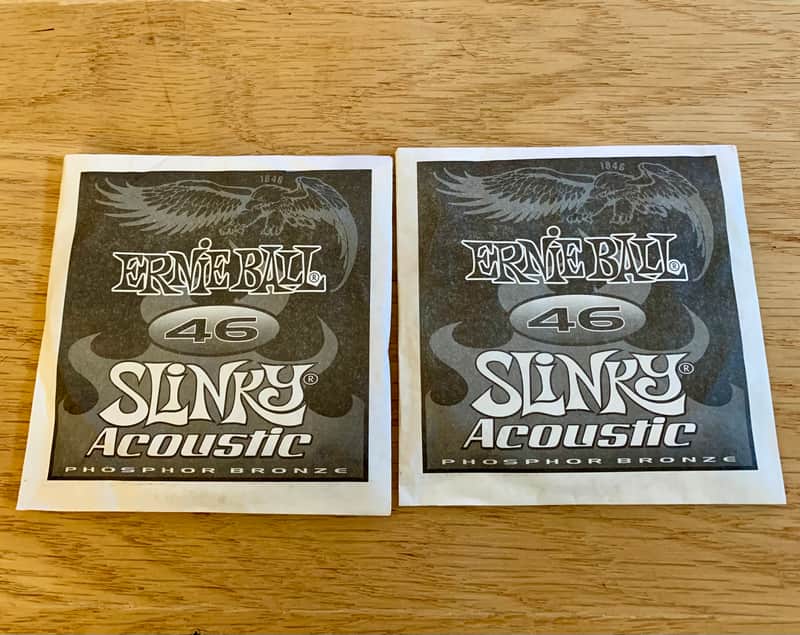 Two Single .046 Gauge Slinky Acoustic Guitar Strings (Ernie Ball - Bronze) Opened, Not Played image 1