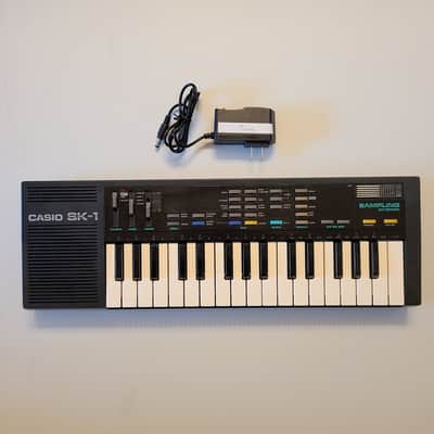 Cleaned Casio SK-1 with power adapter