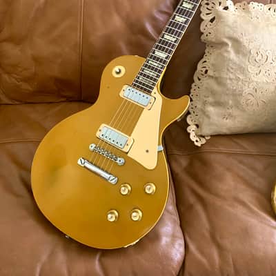 Vintage 1971 Gibson Les Paul Deluxe Goldtop - Rare Dark Back - Embossed Gibson Pickup Covers - Wonderful Condition With No Breaks Or Repairs - Vintage Patent Pending Gold Grover Tuners Installed - 9.4 LBS - Original Purple Lined Case image 1