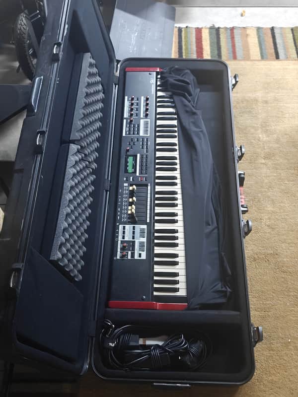 2010-2013 Hammond SK1-73 - Black with Cherry Red side panels. Comes with Rolling Hard Gator Case, pedals and cables. image 1