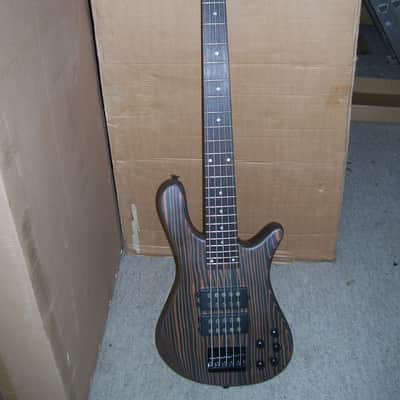 5 string bass guitar,  Zebra wood body. Active pickups. image 1