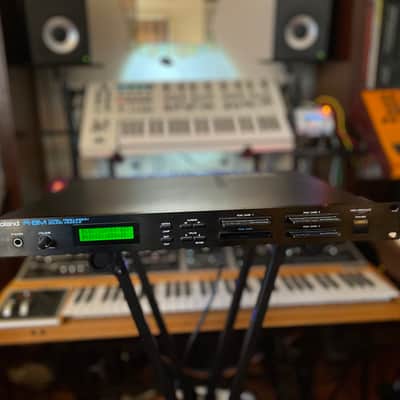 Roland R-8M with 3 ROM cards  (SN-R8-04 Electronic, SN-R8-02 Jazz Brush, and SN-R8-09 Power Drums)