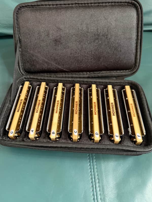Case of 7 Hohner Crossover Harmonicas - Like new image 1