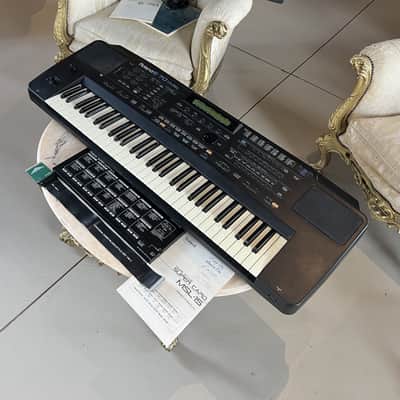 Roland E70 + Roland Super Card MSL-15 + Original Hardcase image 1