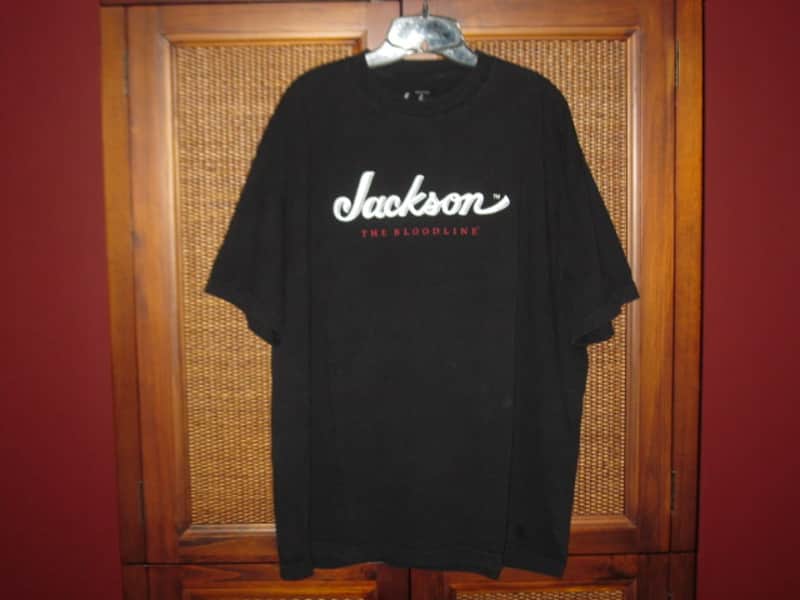 new genuine Jackson (by Fender) Jackson Bloodline 100% Cotton Black Short Sleeve T-Shirt, XXL (size also called: XX-Large, Double XL or 2X), GRAPHIC: White & Red -- P.N (part #): 0990264806 (NO: hang tag / NO packaging) image 1