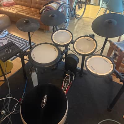 Roland TD-17KV2 with PA-100 amp, DW-5000 pedal, OCDP throne and Zildjian drum rug.