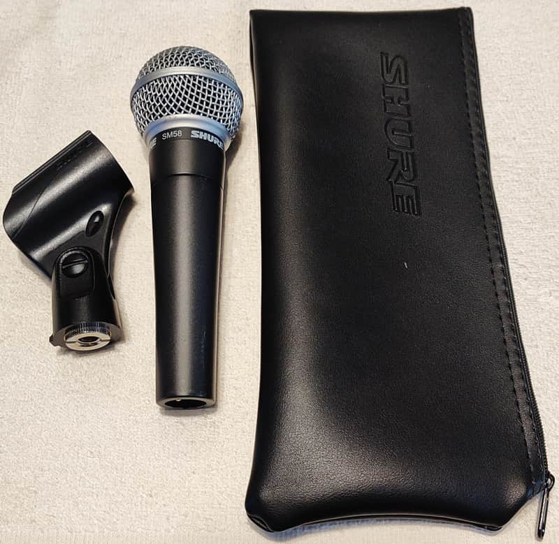 Shure SM58 Handheld Cardioid Dynamic Microphone with mic clip and carry pouch. image 1