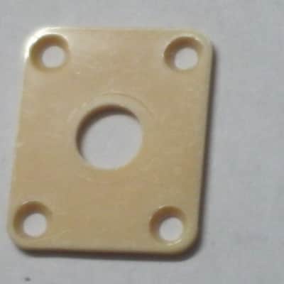 used (has some nicks & scratches) unknown brand CREME PLASTIC RECTANGLE Jack Plate + nickel finish SCREWS (refer to measurements in description) flat - but will flex when installed, might fit Epiphone LP 100 model guitar (NO guitar included) image 2