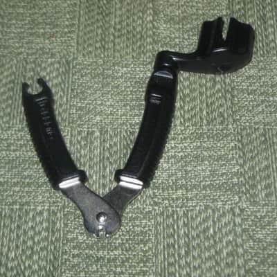 new (no package) very near A+ D'Addario Planet Waves PRO-WINDER Black String Winder & Cutter & Bridge Pin Puller DP0002 for guitar, mandolin, ukulele & banjos (black hard plastic with hardened steel wire cutters) just has few minor natural imperfections image 25