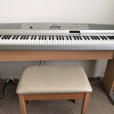 Yamaha DGX 500 Portable Grand Keyboard w/ bench image 1