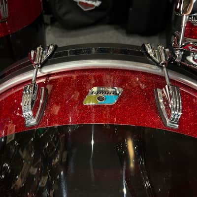 Ludwig 50th Anniversary Vistalite Pro Beat 24/16/13" Drum Set Kit in Red Sparkle/Smoke/Red Sparkle from NAMM image 6