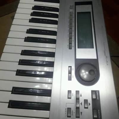 Korg Triton LE 61 w/ Drum Setup