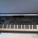 Dave Smith Instruments Prophet 08 PE 61-Key 8-Voice Polyphonic Synthesizer 2009 - 2015 - Black with Wood Sides