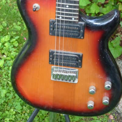 Carvin electric guitar neck thru sunburst image 2