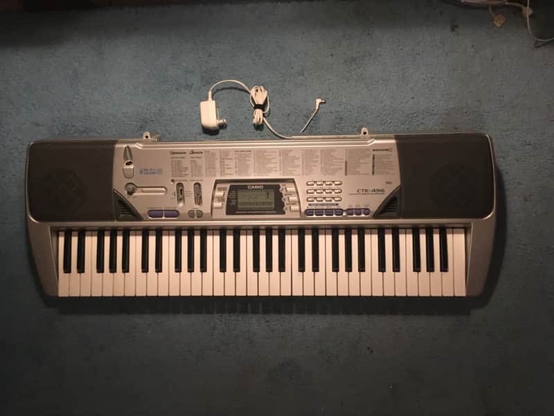 Casio CTK-496 100 Song Bank Keyboard MIDI Jacks & Mic Mix In & AC Adapter image 1