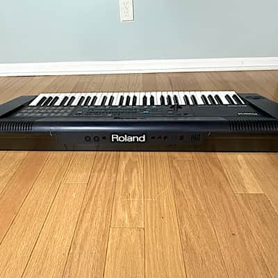 Roland EM-303 Intelligent Arranger Synthesizer, 61 Dynamic Keys, w/ Gig Bag, Music Rest, Adapter & Owner's Manual Very Good Condition image 8