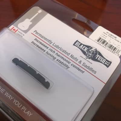 Graph Tech PT-1204-00 BLACK TUSQ XL 1-1/4" E-to-G Slotted Precision Bass-Style Nut image 1