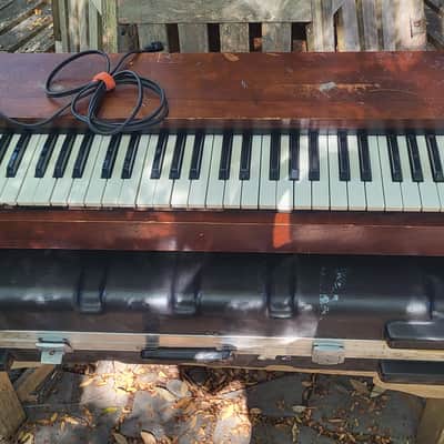 Korg CX3 1980s (?) - Brown/ wood. Black and white keys