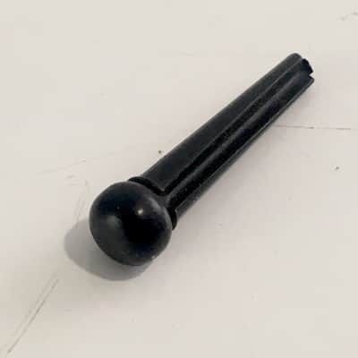 One Solid Black Guitar Bridge Pin For Acoustic Guitar Unknown Brand Vintage MIJ? image 1