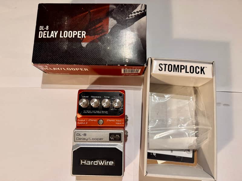 Black and white box with "DELAY LOOPER" and a silver stompbox inside.