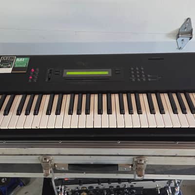 Korg M1 keyboard with orchestra card and flight case