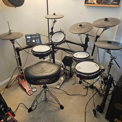 Roland TD-25KV V-Drum Kit t with additional cymbal, double bass pedal, hi-hat stand, and throne