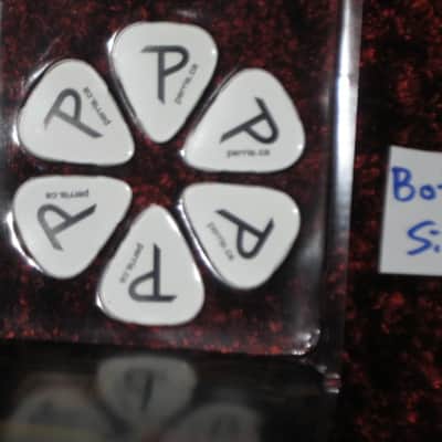new in package (old stock) A+ Perri's Leather Ltd. / Perri's 12 Pack Of Pink Floyd Guitar Picks - Med Gauge - Celluloid Plastic, 351 shape - but slightly curved (LP12-PF1) LP12PF1 image 17