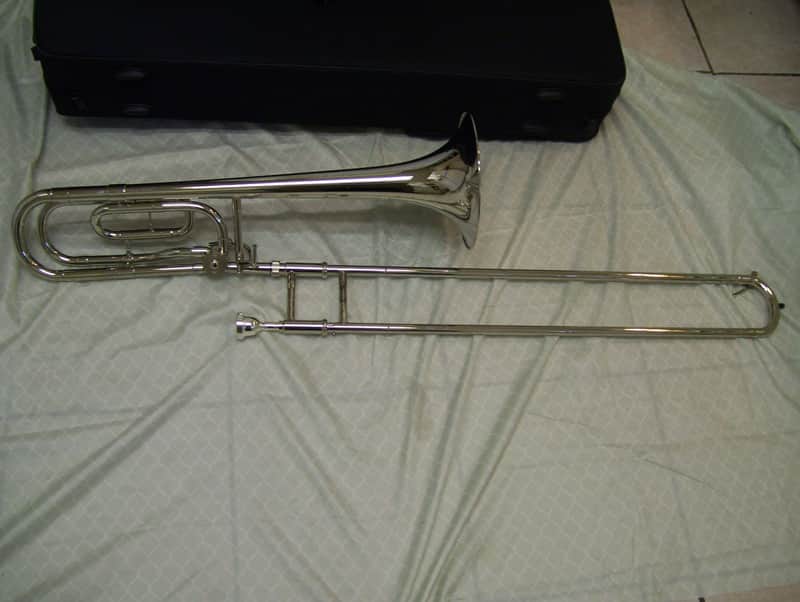 Silver Trigger trombone, with case and mouthpiece image 1