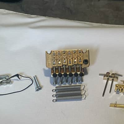 2020's Used FRT-01000 1000 Series Licensed Floyd Rose Gold Guitar Tremolo Bridge Set