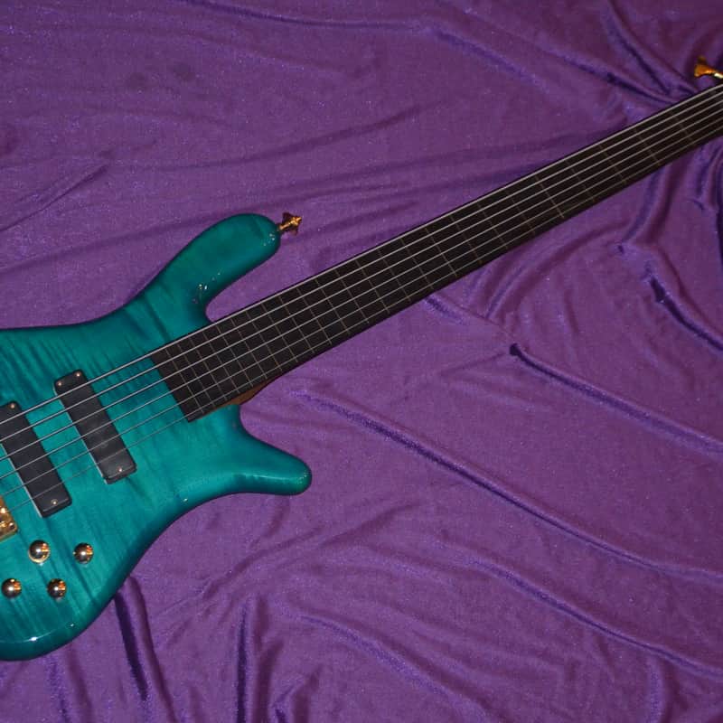 2004 Warwick Streamer LX 6 Fretless Turquoise Transparent