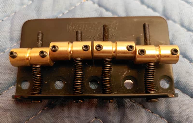 Wilkinson 4-string bass bridge black w/brass saddles, like new image 1
