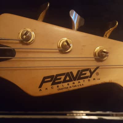 Peavey Axcelerator Series 2006 Metallic red, pearl pickguard. Comes with factory case. image 2