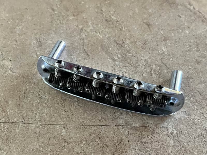 1960s Fender Jazzmaster Jaguar guitar bridge threaded saddles image 1