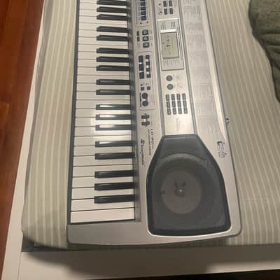 Casio LK-90TV 61-Key Key-Lighting Keyboard 2010s - Silver image 1