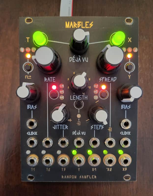 Marbles random sampler module with knobs, switches, and jacks.