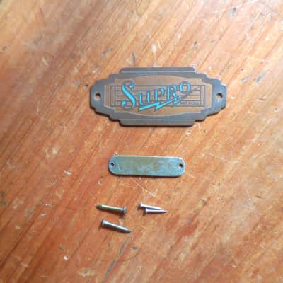 Supro Brass and Enamel Metal Headstock Emblem with Ser. Number plate. image 3
