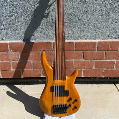 L'Dressy 7-string fretless bass. Mid-2000s - Honey image 1