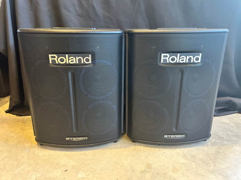 A Pair Of Roland BA 330 Portable Amplifiers - Black, Each includes a Roland Roller case. image 1