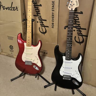 Fender Squier Affinity 'Strat' Stratocaster Black AND a Fender Squier Affinity 'Strat' Stratocaster, 2008 Candy Apple Red with a Maple neck image 1