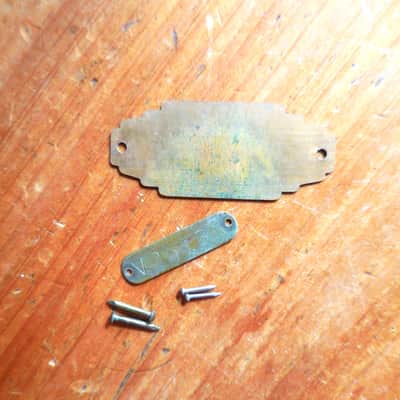 Supro Brass and Enamel Metal Headstock Emblem with Ser. Number plate. image 2