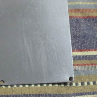 used Boss bottom plate (NO: rubber padding,label,serial number) for compact sized pedal - specifically from mid 1980s - metal, OUTER side: semi-gloss gray fiish / INNER side: flat gray finish -- back end has factory made small cut out for power jack image 11