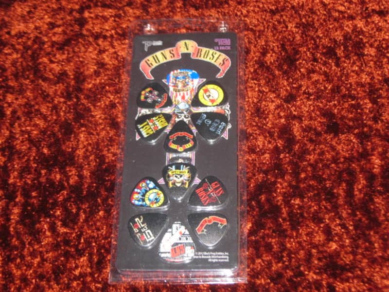 new in package (old stock) A+ Perri's Leather Ltd. / Perri's 12 Pack Of Guns N Roses Guitar Picks - Med Gauge - Celluloid Plastic, 351 shape - but slightly curved (LP12-GNR1) LP12GNR1 image 1