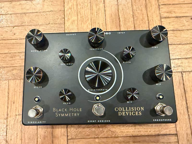 Collision Devices Black Hole Symmetry