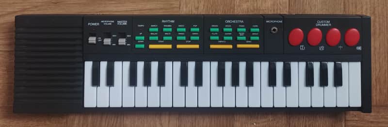 hing hon ek-001 keyboard 80’s Black , blue and red bottonswith white image 1