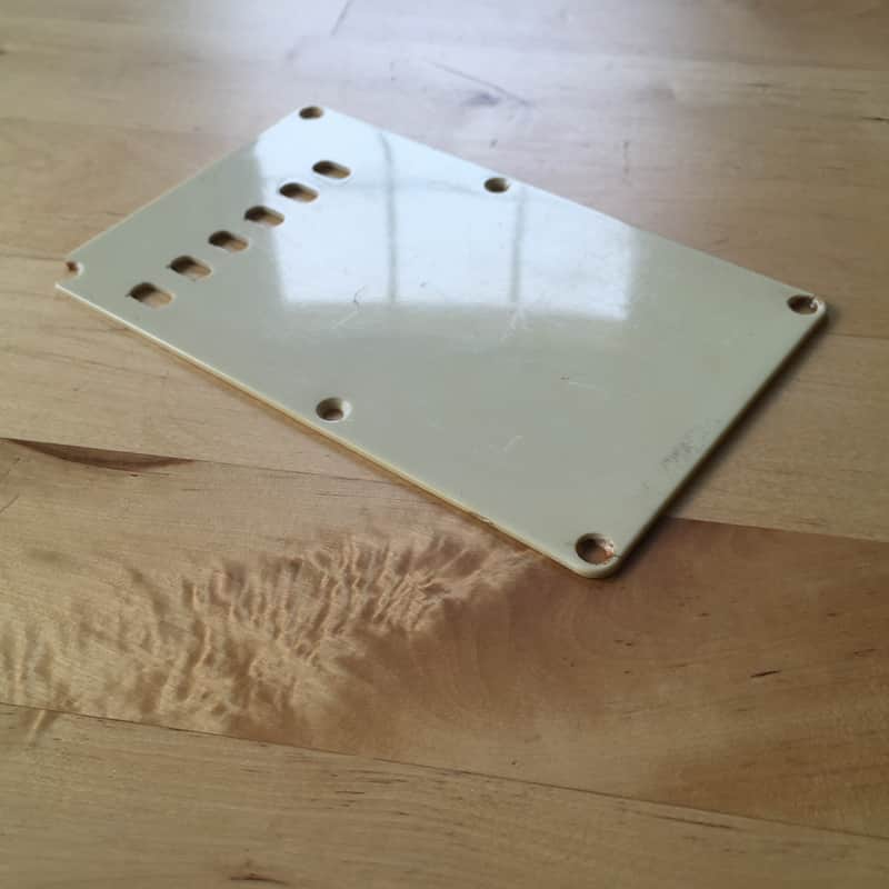 ? Fender Strat Tremolo Back Plate Cover Aged White yellowed